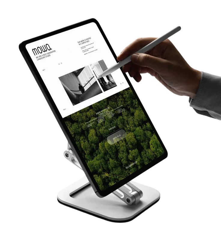Editorial reading app on a tablet stand, annotated with a stylus